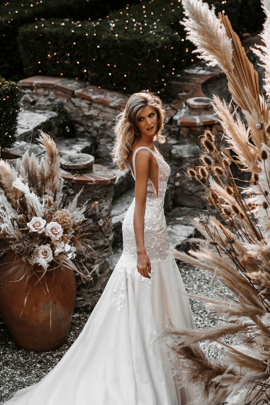 Photo of model wearing a gown by Abella