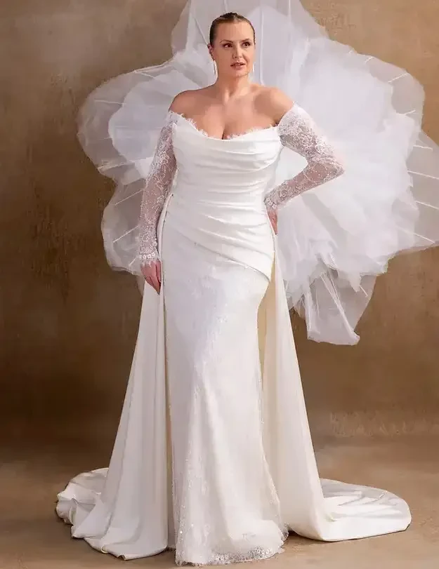 Model wearing a gown by White Rose