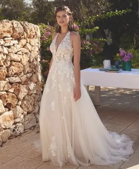 Model wearing a gown by Lillian West