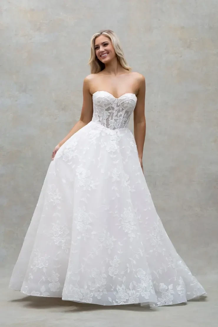 Model wearing a gown by Abella by Sale/Ready to Wear